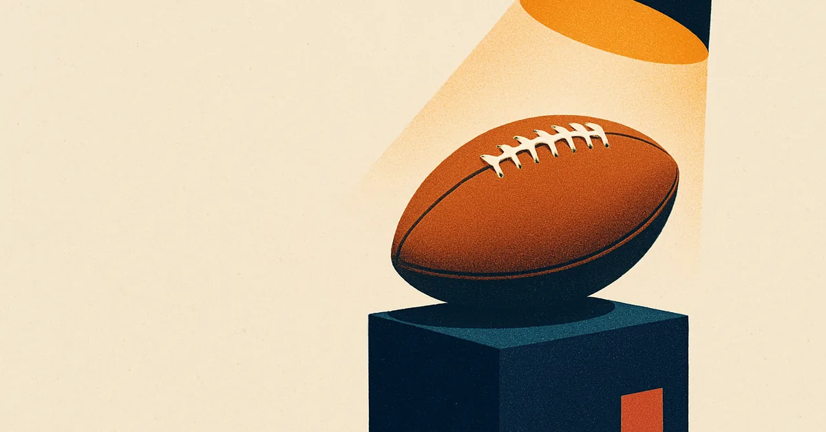 A football on a pedestal under an amber spotlight, illustrating how Super Bowl odds work on prediction markets
